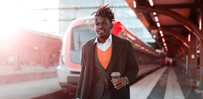 Man standing in front of a train
